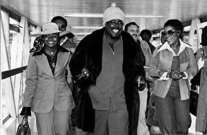 Heathrow Airport Collection: Barry White American soul singer arriving at Heathrow Airport with his wife Glodean White
