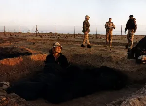 BBC Chief Foreign Correspondent Kate Adie seen here standing in a fox hole in the Western BBC Chief Foreign Correspondent Kate Adie seen here standing in a fox hole in the Western