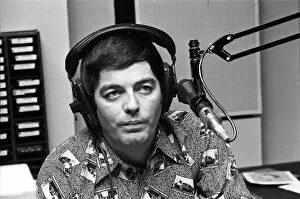 Images Dated 14th October 1976: BBC DJ Tony Blackburn is pictured at work following his recent spilt from his wife