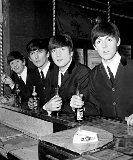 The Beatles at the bar in Paris with their Pepsi. Circa January 1964 The Beatles at the bar in Paris with their Pepsi. Circa January 1964