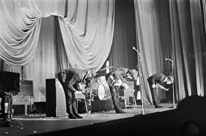 The Beatles take a bow on stage in Carlisle at the end of thier concert The Beatles take a bow on stage in Carlisle at the end of thier concert