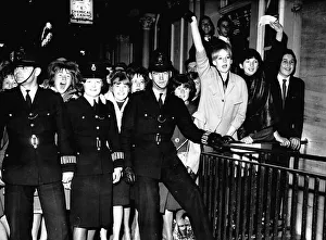 Beatles fans screaming outside the Palladium as they await the arrival of their idols Beatles fans screaming outside the Palladium as they await the arrival of their idols
