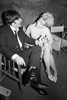 The Beatles on film set for a Hard Days Night John lennon talking to a girl on set The Beatles on film set for a Hard Days Night John lennon talking to a girl on set