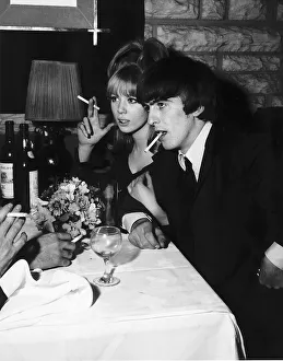 Beatles guitarist George Harrison with his model girlfriend