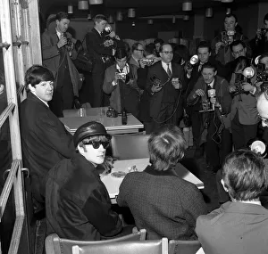 Beatles left to right: Paul McCartney, John Lennon and George Harrison at a press Beatles left to right: Paul McCartney, John Lennon and George Harrison at a press