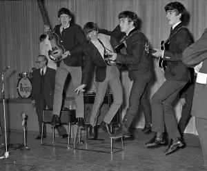 The Beatles play about and jump in the air during the rehearsals for the Royal Variety The Beatles play about and jump in the air during the rehearsals for the Royal Variety
