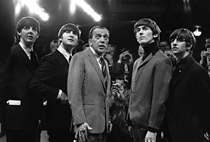The Beatles with television host Ed Sullivan during their appearance on the Ed Sullivan The Beatles with television host Ed Sullivan during their appearance on the Ed Sullivan