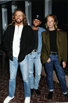 Bee gees Pop Group Brothers Barry Maurice and Robin Gibb arrive at Heathrow from New York Bee gees Pop Group Brothers Barry Maurice and Robin Gibb arrive at Heathrow from New York