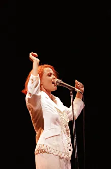 Belinda Carlisle May 1990 Singer performing in concert on stage singing Belinda Carlisle May 1990 Singer performing in concert on stage singing