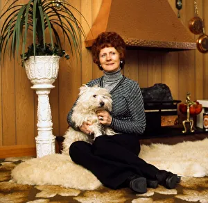 Betty Lawrie at home holding dog March 1975 Betty Lawrie at home holding dog March 1975
