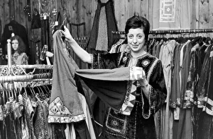 Betty Van Gelder, owner of a dress shop in Hampstead, wearing one of her own velvet Betty Van Gelder, owner of a dress shop in Hampstead, wearing one of her own velvet