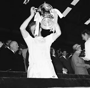 Billy Bremner Leeds United captain holds the cup aloft moment after being presented with Billy Bremner Leeds United captain holds the cup aloft moment after being presented with