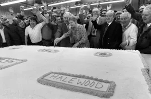 Billy Hughes cuts into the monster birthday cake to celebrate Fords 25th birthday at Billy Hughes cuts into the monster birthday cake to celebrate Fords 25th birthday at