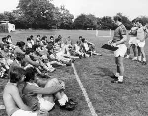 Birmingham City players listen to instructions from manager Jim Smith during a pre season Birmingham City players listen to instructions from manager Jim Smith during a pre season