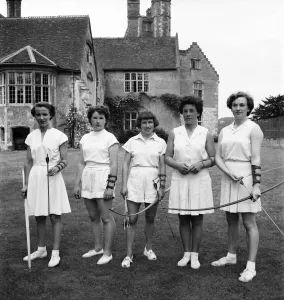 Bisham Abbey Physical recreation Ccentre. A group of women on the lawns in front of Bisham Abbey Physical recreation Ccentre. A group of women on the lawns in front of