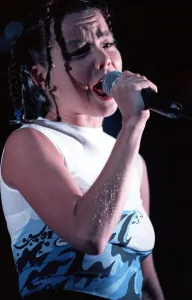 Bjork singer from Iceland on stage at the Irvine Festival with mouth open singing Bjork singer from Iceland on stage at the Irvine Festival with mouth open singing