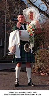 Blind Date Wedding January 1998 Robert Taggart holds up his new bride Leigh Singleton Blind Date Wedding January 1998 Robert Taggart holds up his new bride Leigh Singleton