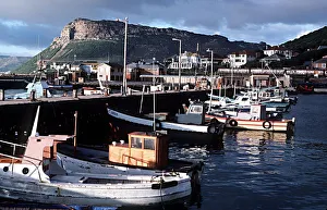 Boats in the harbour of Kalk Bay in Capetown in the early morning Boats in the harbour of Kalk Bay in Capetown in the early morning