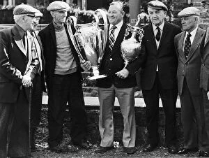 00236 Collection: Bob Paisley former manager of Liverpool FC Football 1977 holding football trophies