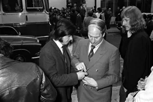 Bobby Charlton of Manchester United signs autograph 1971 for a fan Bobby Charlton of Manchester United signs autograph 1971 for a fan
