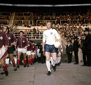 Bobby Moore seen here leading the England team out in the match against Malta played at Bobby Moore seen here leading the England team out in the match against Malta played at