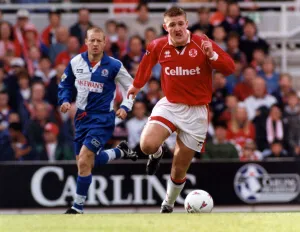 Boro's Jamie Pollock tries an early break against Blackburn Rovers Boro's Jamie Pollock tries an early break against Blackburn Rovers