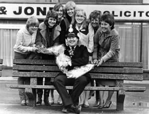 Bouquets for Huyton policeman David Henderson from local shop keepers Bouquets for Huyton policeman David Henderson from local shop keepers