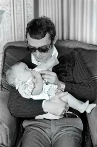 Boxer Alan Minter pictured at his Crawley Sussex home with his six month old baby Boxer Alan Minter pictured at his Crawley Sussex home with his six month old baby