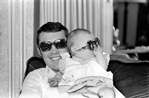 Boxer Alan Minter pictured at his Crawley Sussex home with his six month old baby Boxer Alan Minter pictured at his Crawley Sussex home with his six month old baby