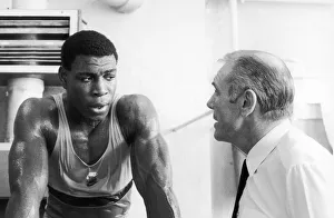 Boxer Frank Bruno with his trainer. 22nd April 1984 Boxer Frank Bruno with his trainer. 22nd April 1984