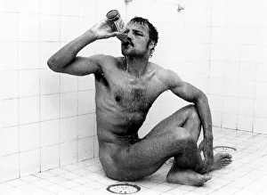 Boxer John Conteh drinking beer in the shower December 1978 Boxer John Conteh drinking beer in the shower December 1978