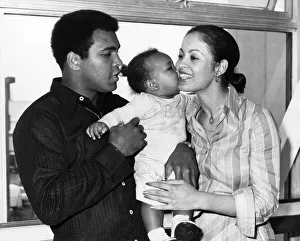 Boxer Mohammad Ali with his wife Veronica and 1 year old baby Hanna leaving Heathrow Boxer Mohammad Ali with his wife Veronica and 1 year old baby Hanna leaving Heathrow
