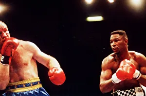 Boxing Lennox Lewis in action against Jean-Maurice Chanet Boxing Lennox Lewis in action against Jean-Maurice Chanet