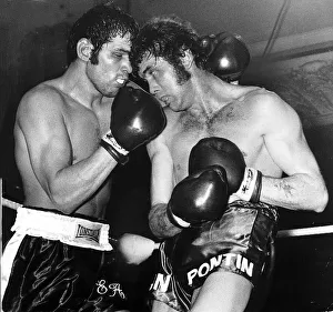 Boxing, punishing moment as Chris Finnegan (right) corners Eddie Avoth Boxing, punishing moment as Chris Finnegan (right) corners Eddie Avoth
