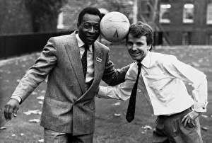 Former Brazilian football star Pele poses with Sports Minister Colin Moynihan MP while Former Brazilian football star Pele poses with Sports Minister Colin Moynihan MP while