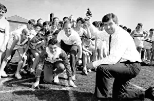 Brendan Foster, watched by Paul Ponton (centre) and Royal Grammer School sprinter Jason Brendan Foster, watched by Paul Ponton (centre) and Royal Grammer School sprinter Jason