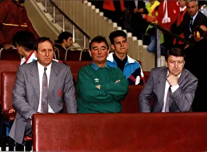 Brian Clough, Nottingham Forest manager, sitting on bench with club officials during FA Brian Clough, Nottingham Forest manager, sitting on bench with club officials during FA