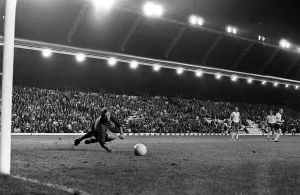 Brian Kidd scores for Manchester United past Bob Wilson of Arsenal at Anfield Brian Kidd scores for Manchester United past Bob Wilson of Arsenal at Anfield