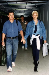 Brigitte Nielsen actress with her boyfriend arrive at Heathrow Airport Brigitte Nielsen actress with her boyfriend arrive at Heathrow Airport