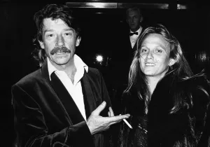 British actor John Hurt arrives at the Royal Albert Hall in London with his wife Donna to British actor John Hurt arrives at the Royal Albert Hall in London with his wife Donna to