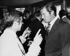 British actor Roger Moore July 1970 chatting with Bryan Forbes Associated British actor Roger Moore July 1970 chatting with Bryan Forbes Associated