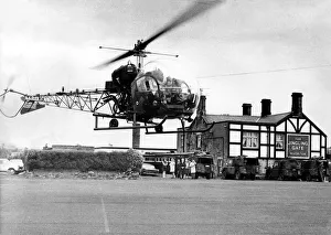 A British Army Westland Sioux helicopter dropped into the car park at the Jingling Gate A British Army Westland Sioux helicopter dropped into the car park at the Jingling Gate
