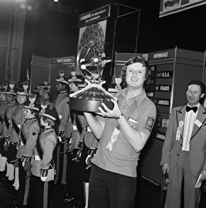 British dart player Eric Bristow holds aloft the trophy after winning the Worlds Masters British dart player Eric Bristow holds aloft the trophy after winning the Worlds Masters