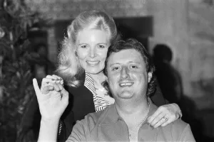 British dart player Eric Bristow poses with Maureen Flowers at the Embassy World British dart player Eric Bristow poses with Maureen Flowers at the Embassy World