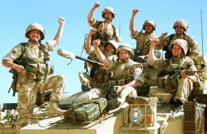 British infantrymen celebrate on a Warrior Armoured Personnel Carrier during the Gulf British infantrymen celebrate on a Warrior Armoured Personnel Carrier during the Gulf