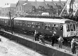 One of British Rails Diesel Multiple Units on the local Riverside Line watched by One of British Rails Diesel Multiple Units on the local Riverside Line watched by