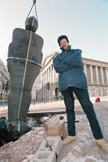 British sculptor Antony Gormley stands beside his latest work British sculptor Antony Gormley stands beside his latest work