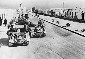 British tanks make their way through a town in Algeria during the Second World War British tanks make their way through a town in Algeria during the Second World War