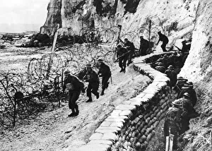 British troops patrol beaches as part of the British coastal defences during WW2 1941 British troops patrol beaches as part of the British coastal defences during WW2 1941