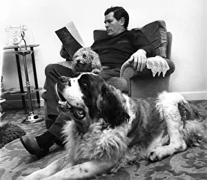British wrestler Count Bartelli relaxes with a good book British wrestler Count Bartelli relaxes with a good book